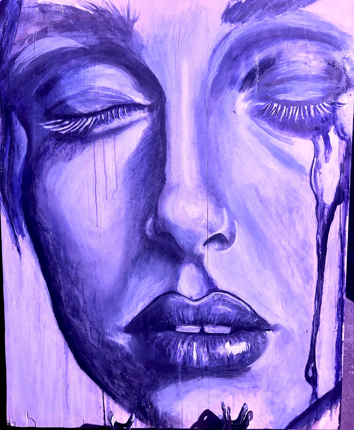 Close-up painted portrait with closed eyes and visible vertical drips.